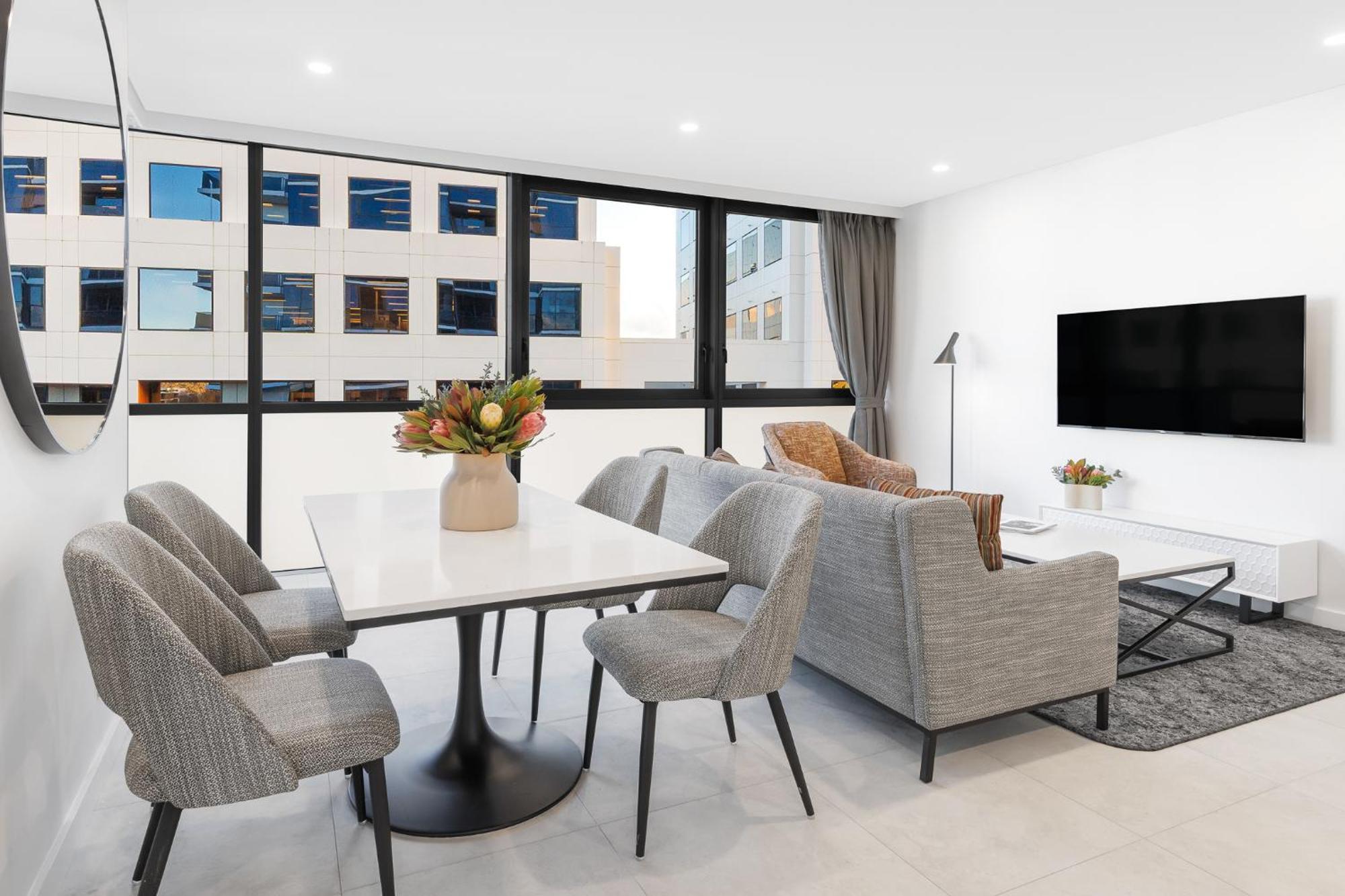 Meriton Suites Canberra Exterior photo A staged apartment