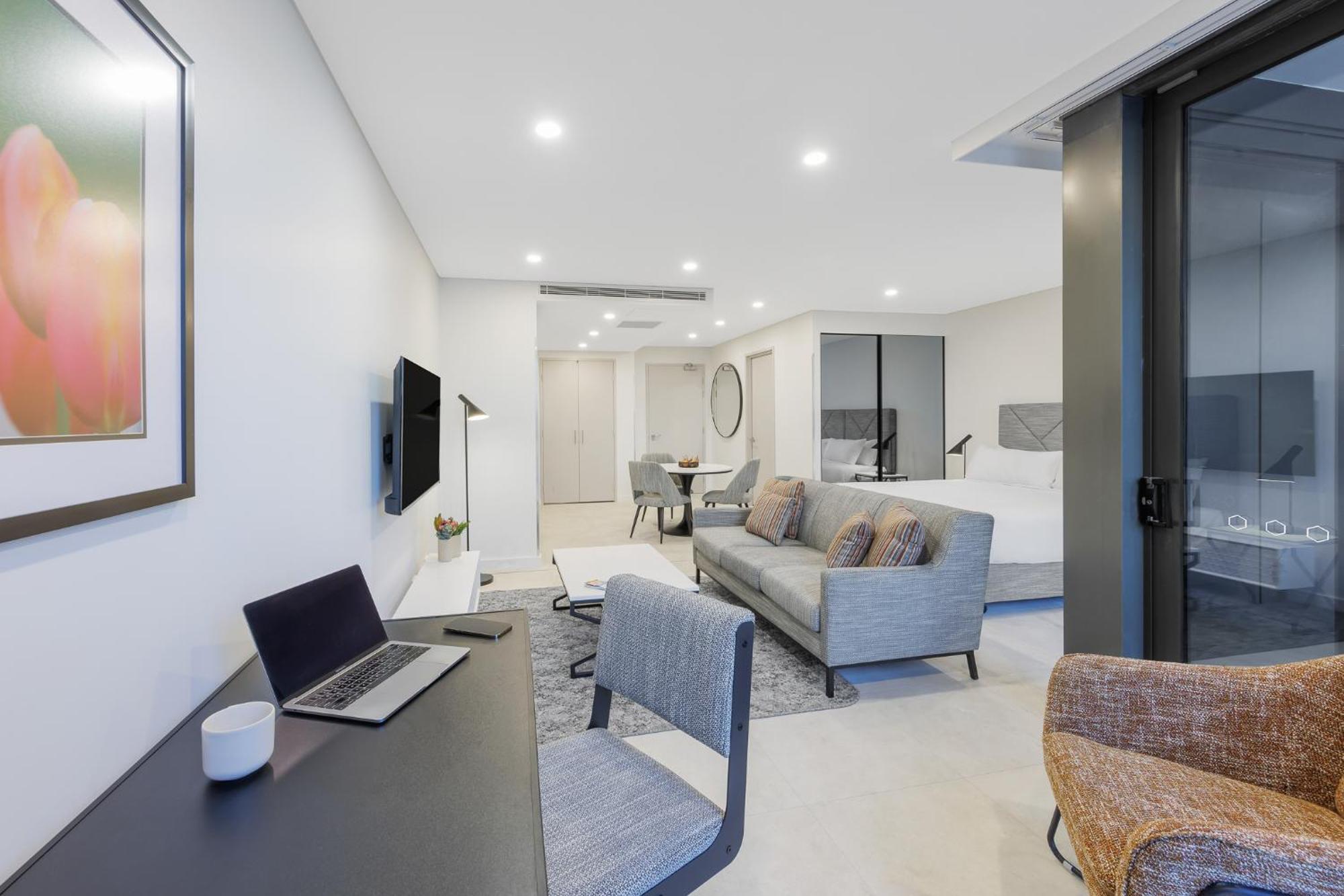 Meriton Suites Canberra Exterior photo A typical apartment interior