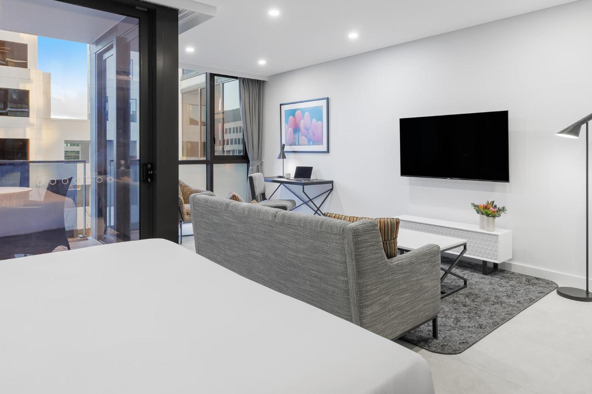 Meriton Suites Canberra Exterior photo The interior of a typical apartment